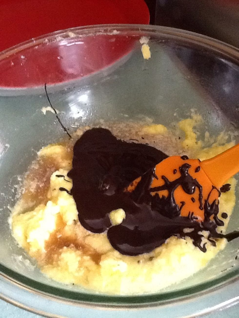 Mix together melted chocolate, water, and vanilla