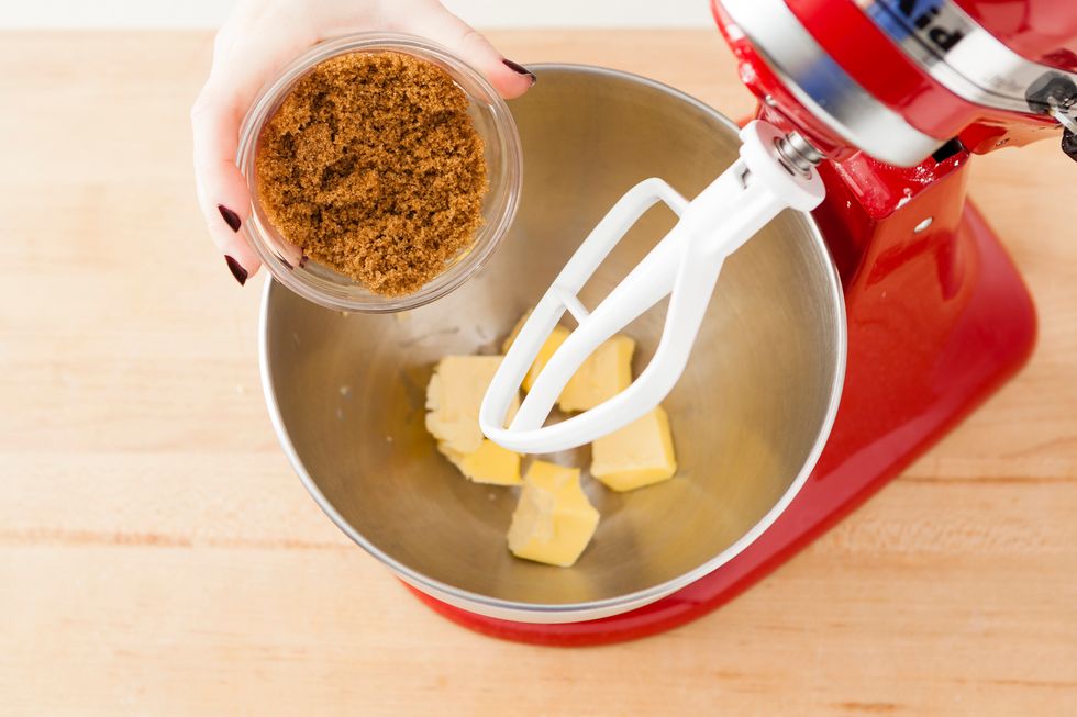 Mix together softened butter and brown sugar.