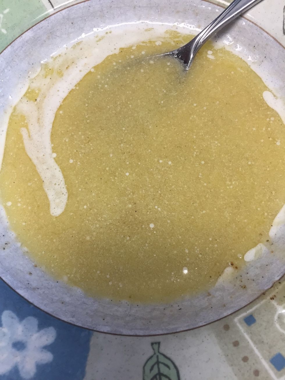 Mix together the egg, butter and vanilla