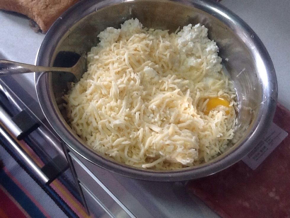 Mix together the ground cheese,cottage cheese and eggs.