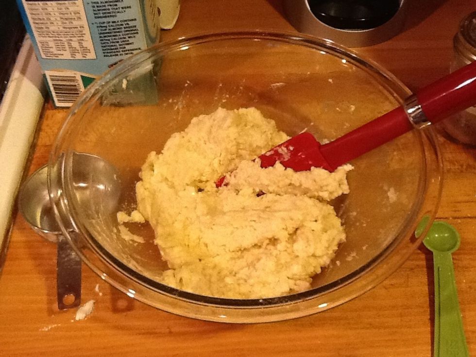 Mix together the wet and dry ingredients. *just* mix together. Do not overmix. Usually a mix or two and then scraping the sides down into the mix is enough.