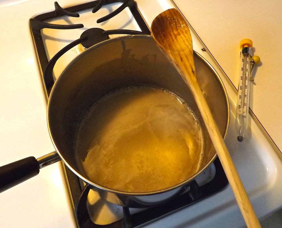 Mix together your sugar, syrup, salt, and water in a pot on medium heat.  Once it\u2019s thoroughly incorporated, drop in the thermometer and continually stir. Temp should read 240.