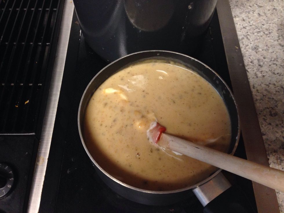 Mix two cans of cream of mushroom with ranch packets, sour cream and milk into a pan to simmer.