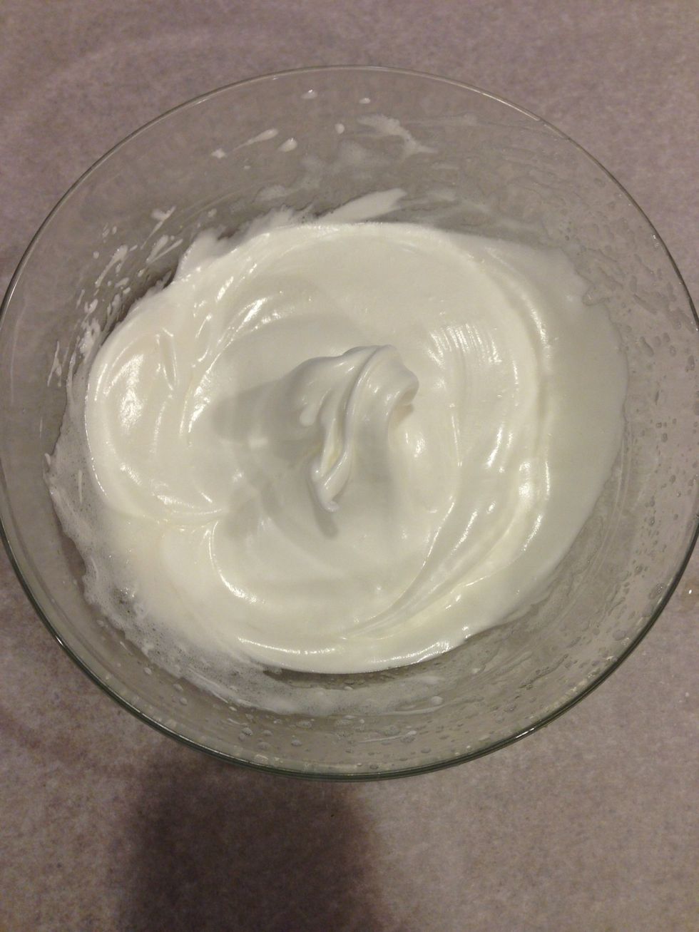 Mix until it is a stiff peak! You'll know because it'll look like whipped cream and when you flip the bowl over, it's not runny.