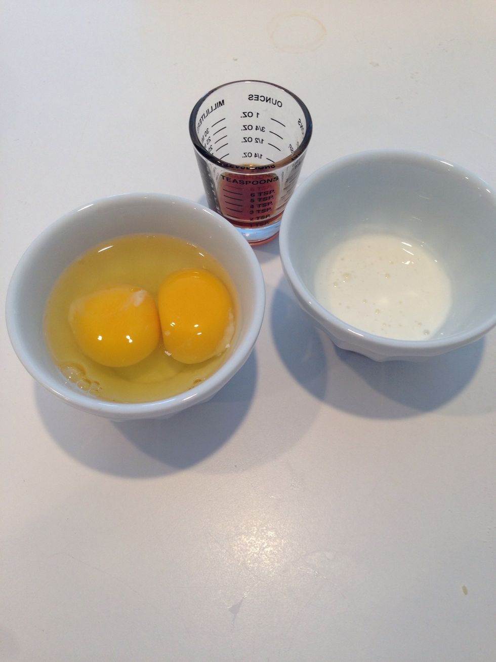 Mix until the butter looks like little pebbles. Then add the wet ingredients , shown here. Save the extra egg white- we might make meringues.
