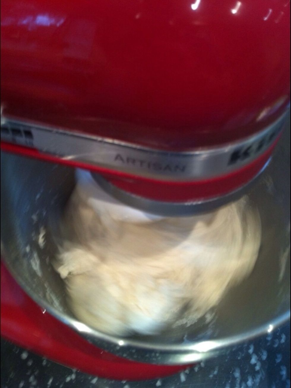 Mix until the dough comes away from the sides of the bowl and makes a soft pliable dough