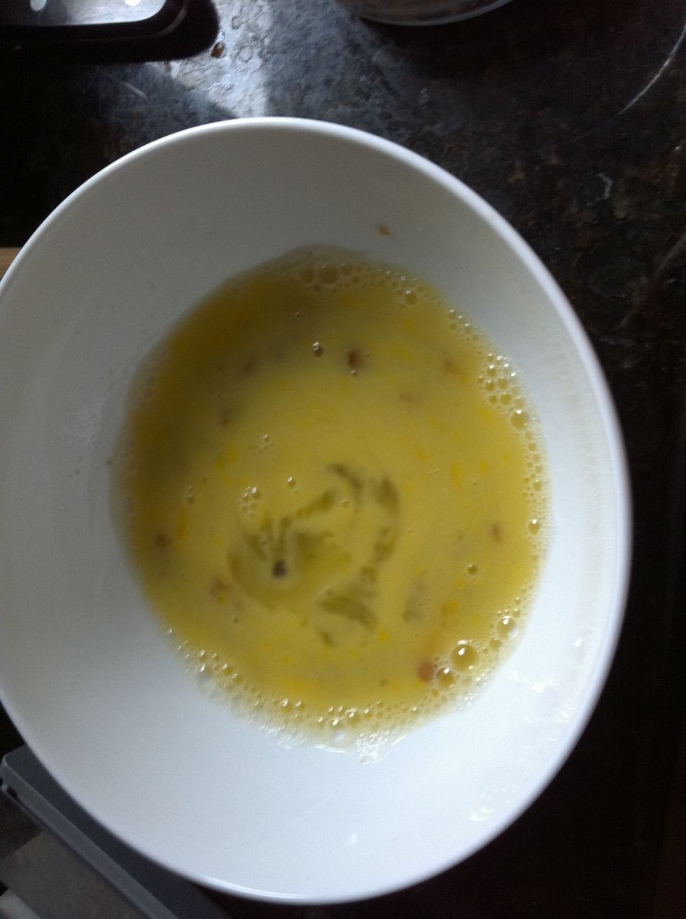Mix until yolk is broken. Yolks will "explode" in microwave unless broken.