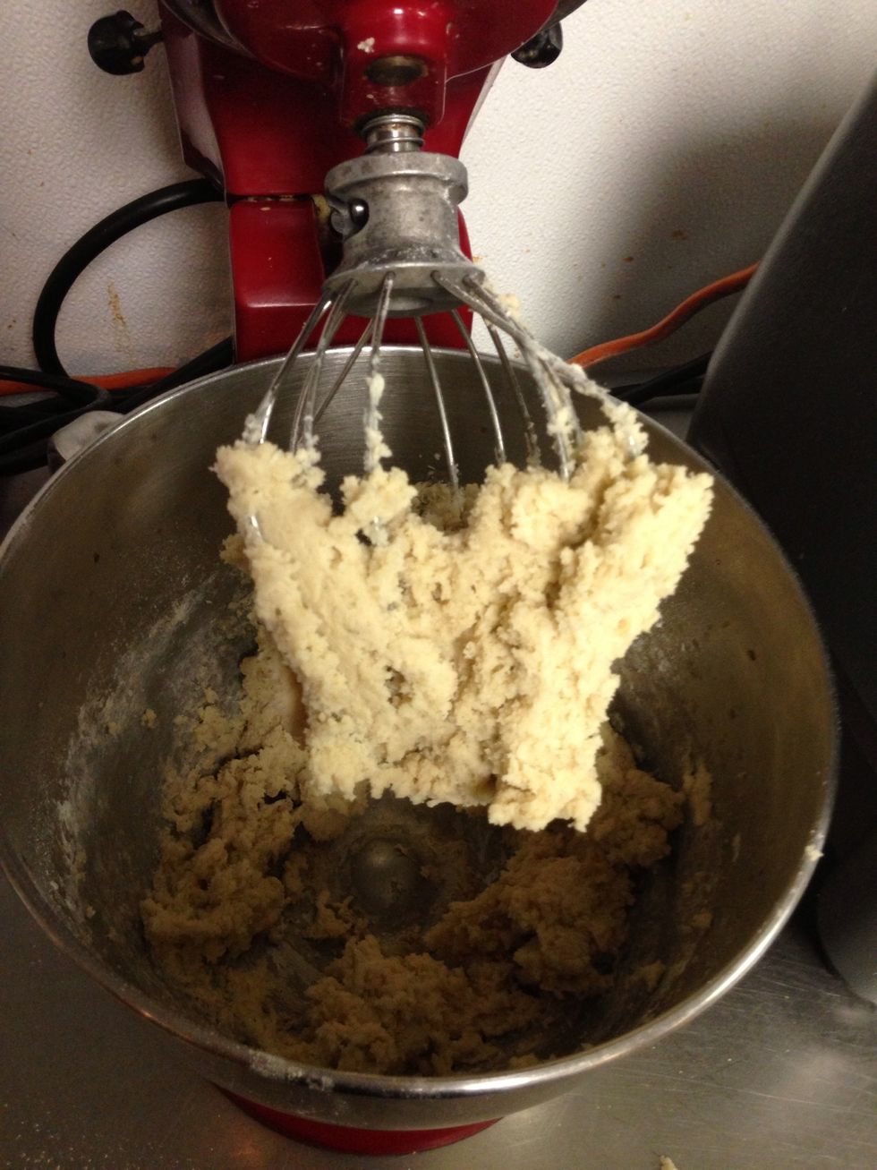Mix until you get a sticky dough about a minute, scrape the bowl edges now an then
