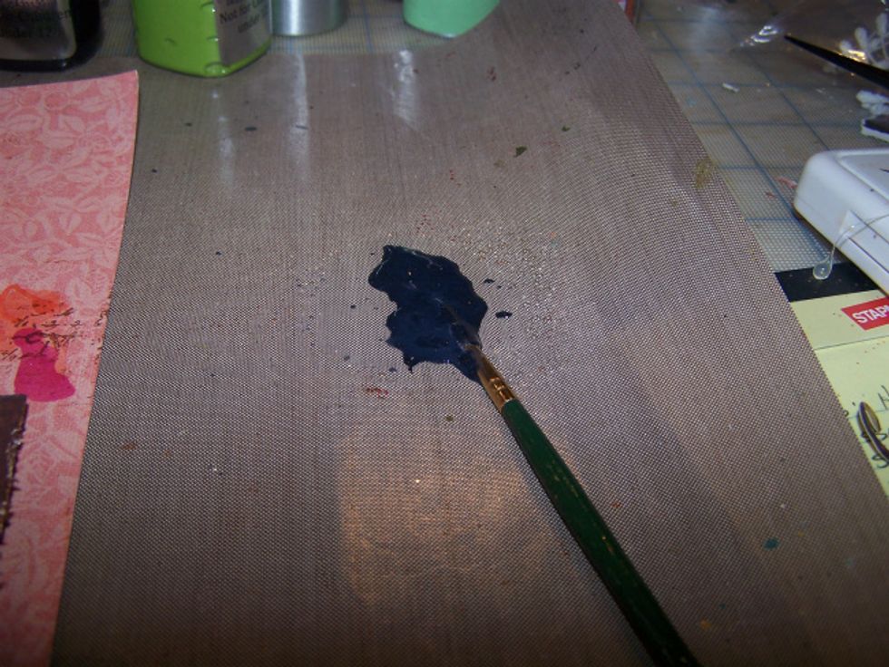 Mix Velvet Tuxedo with a few sprays of water until it's thin and add random splatters to layout.