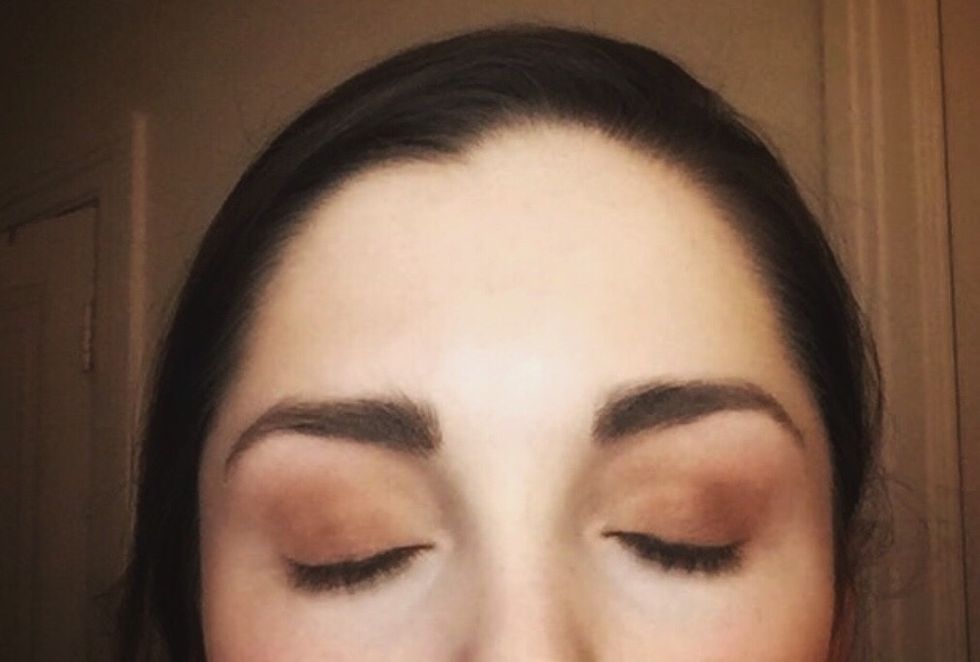 Mix warmth and cozy using a smudge brush to buff into the outer corner and up into the crease (blend using the blending crease brush if needed).