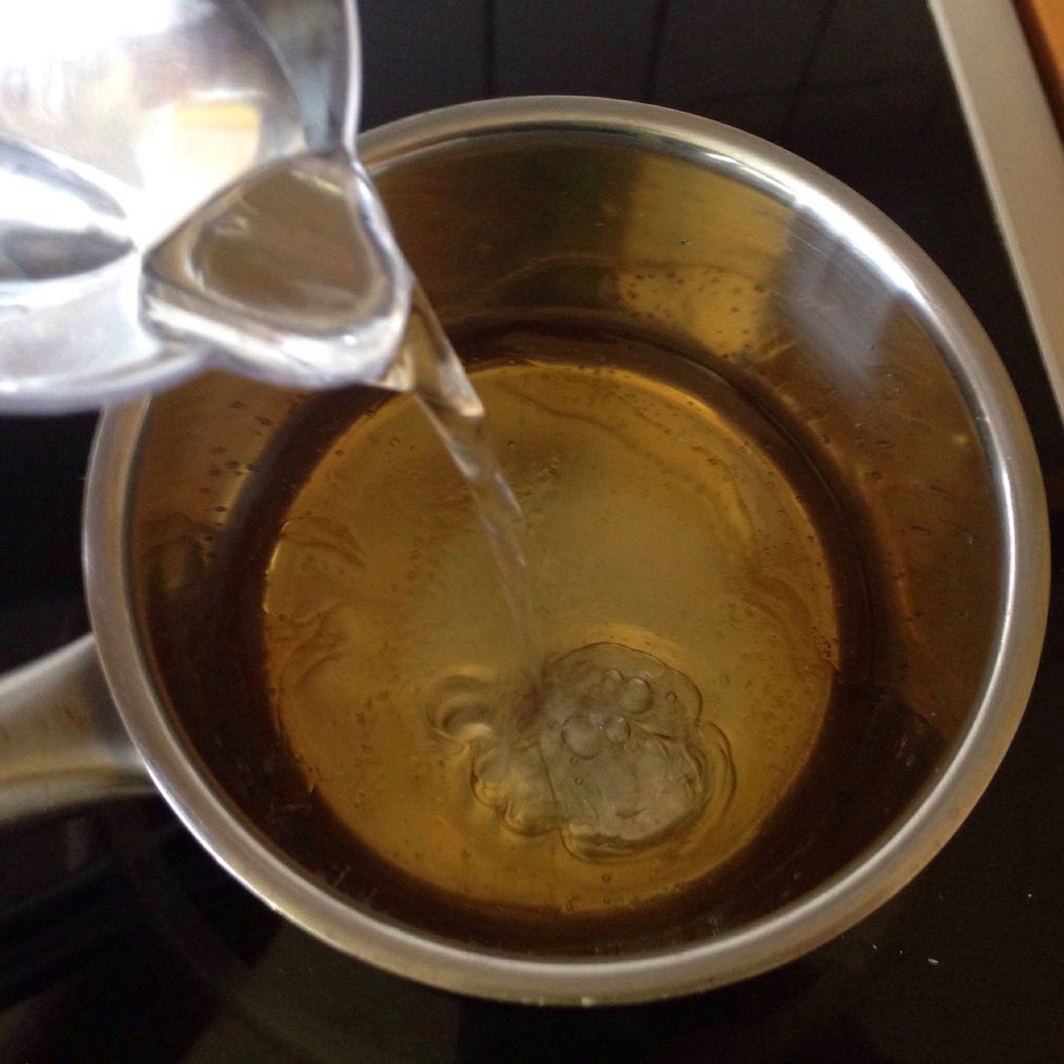 Mix water and honey into a saucepan and warm it gently up to the honey is completely melted