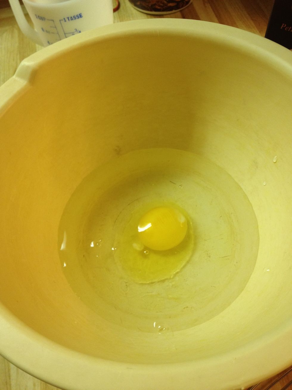 Mix water, egg and 3 table spoons oil into bowl
