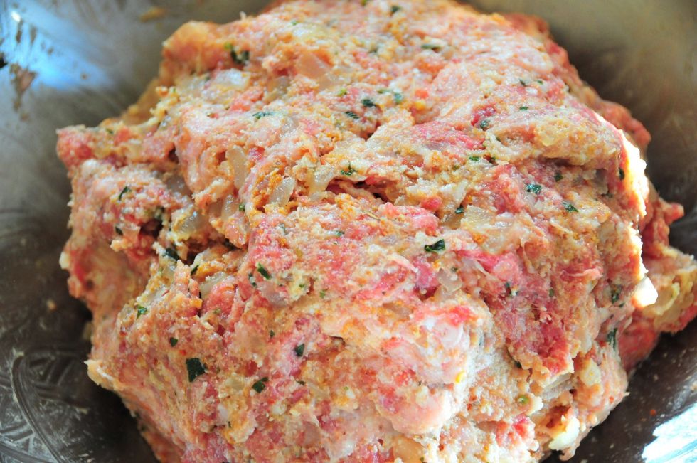 Mix well so all ingredients are combined, but don't over mix it or the meatballs will be a bit chewy.  Let it sit for about 10 minutes before rolling into balls.
