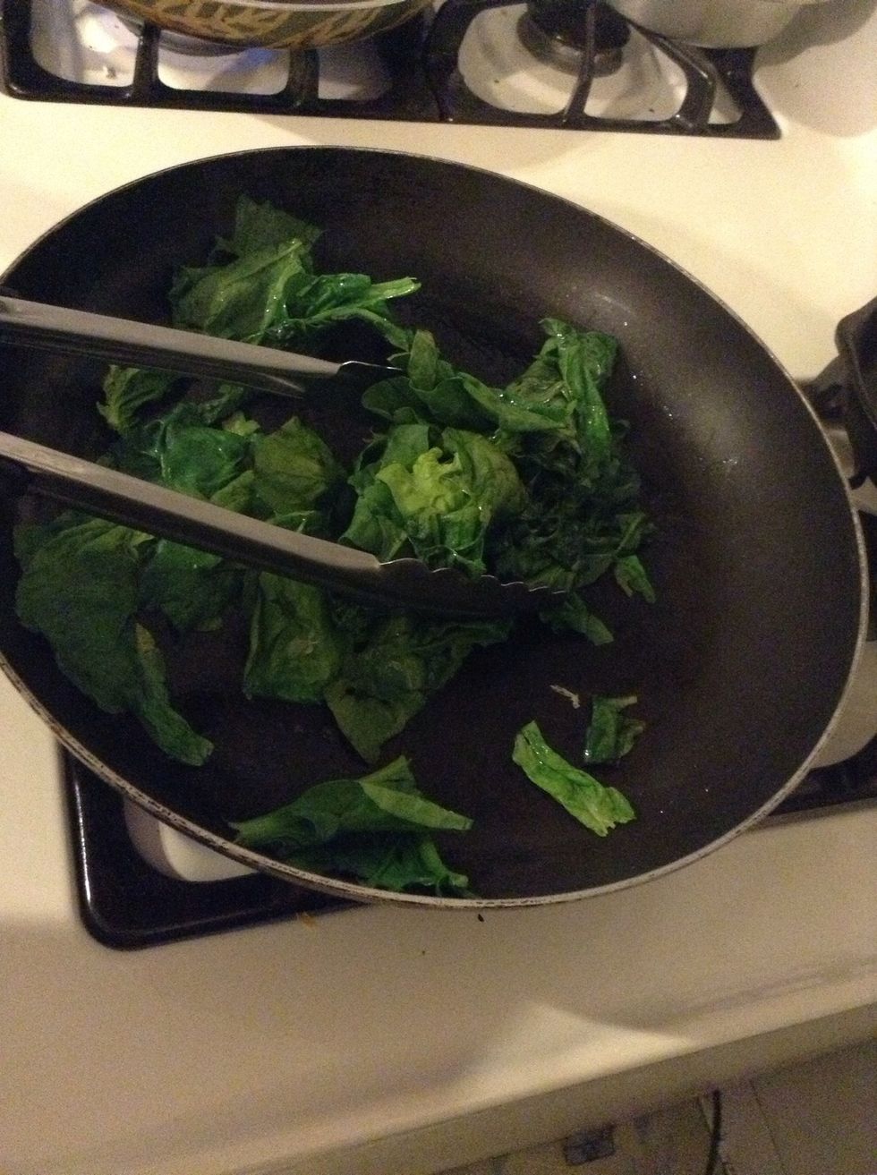 Mix well. Spinach cooks real fast so you want to time it with the rest of your meal so it doesn't get cold or overcook.