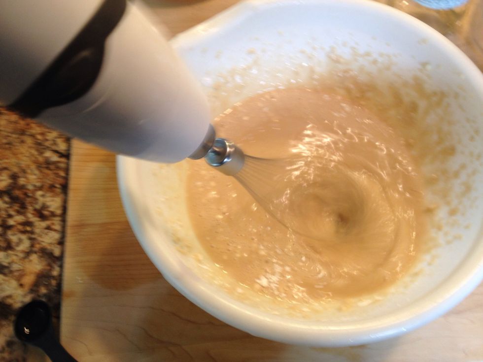 Mix wet and dry ingredients.