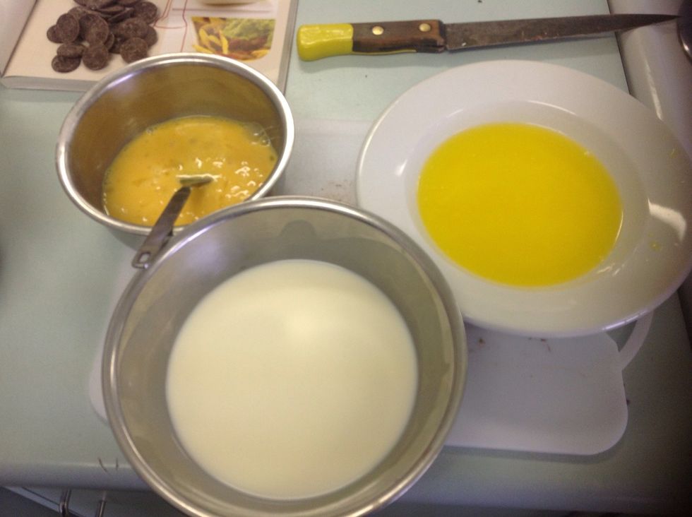 Mix whisked egg, milk and melted butter together.