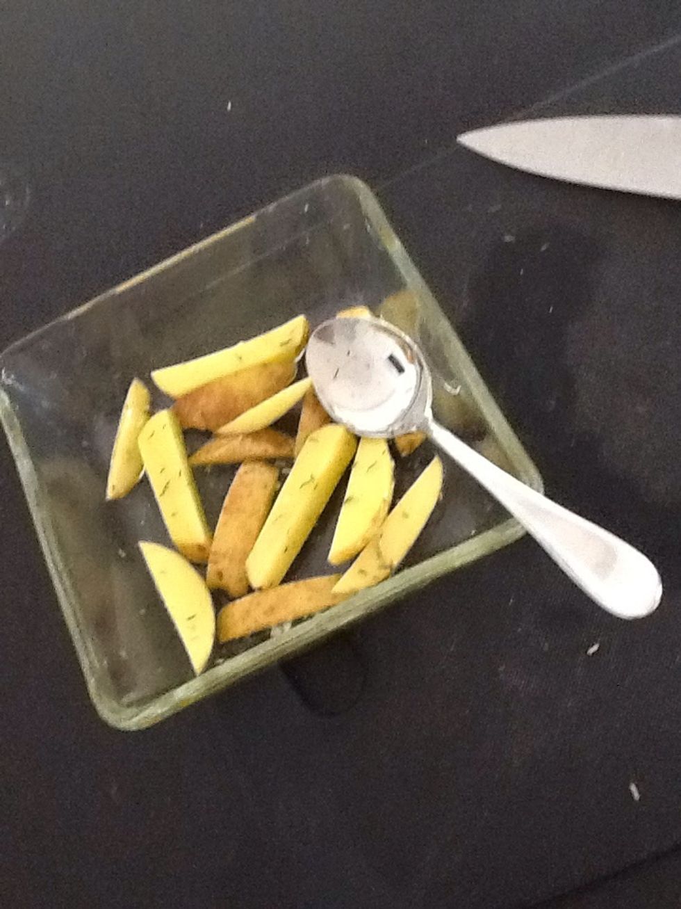 Mix with a spoon, so the oil gets all over the potatoes