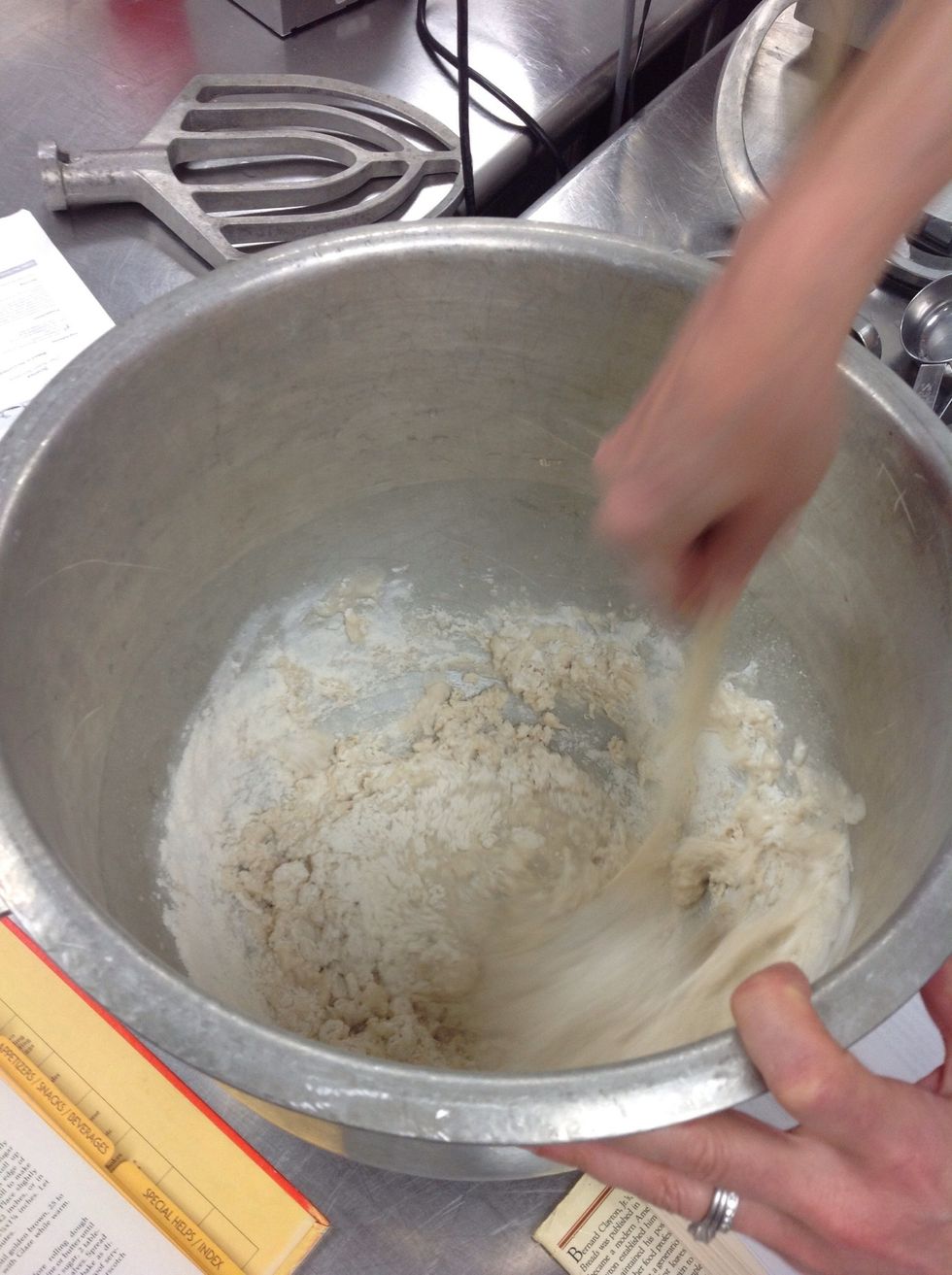 Mix with a wooden spoon until the ingredients are incorporated.