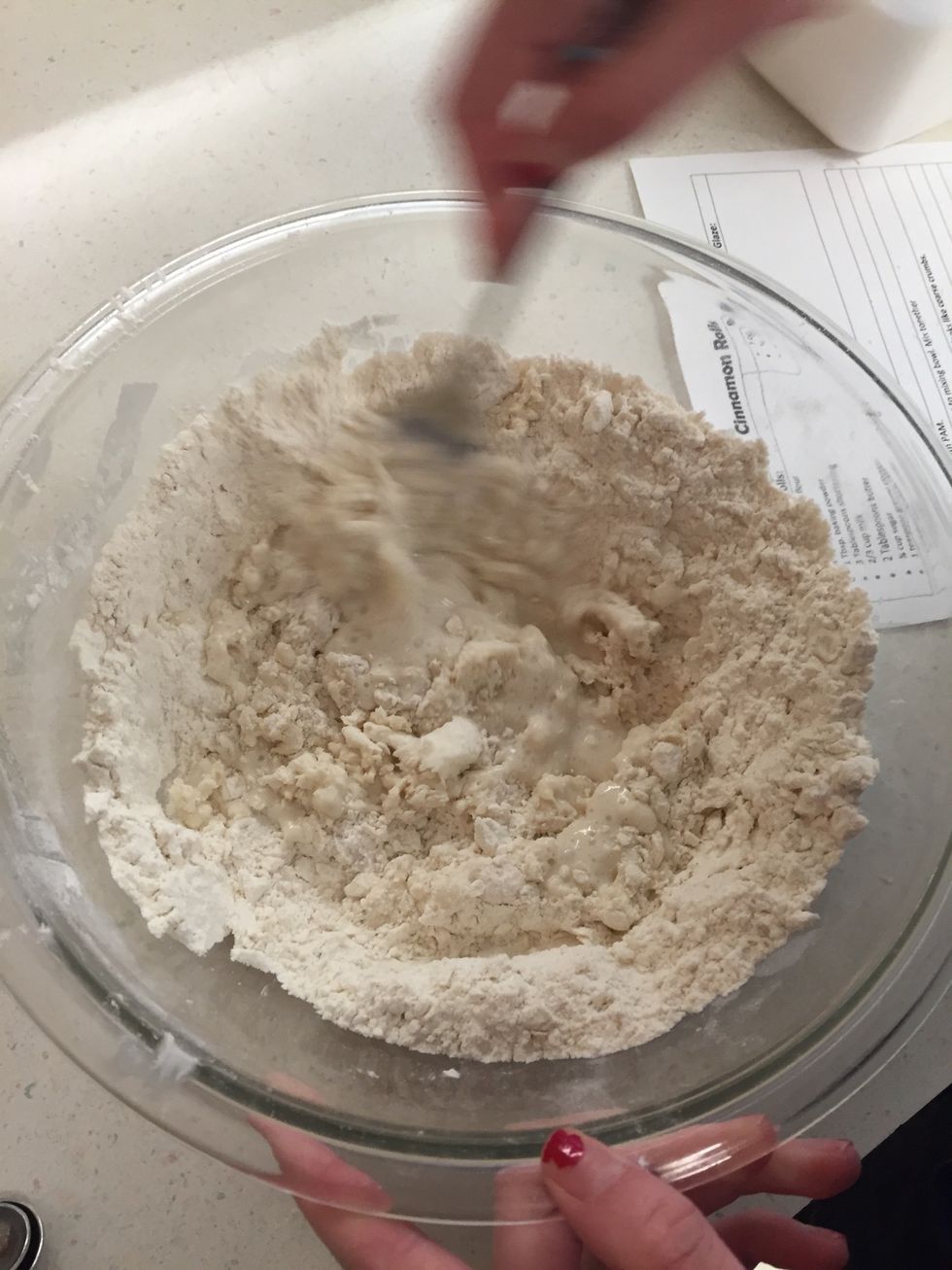 Mix with fork until dough forms