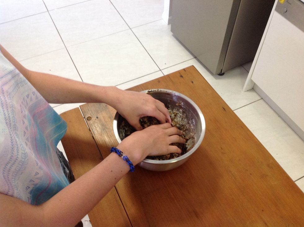 Mix with hands until combined