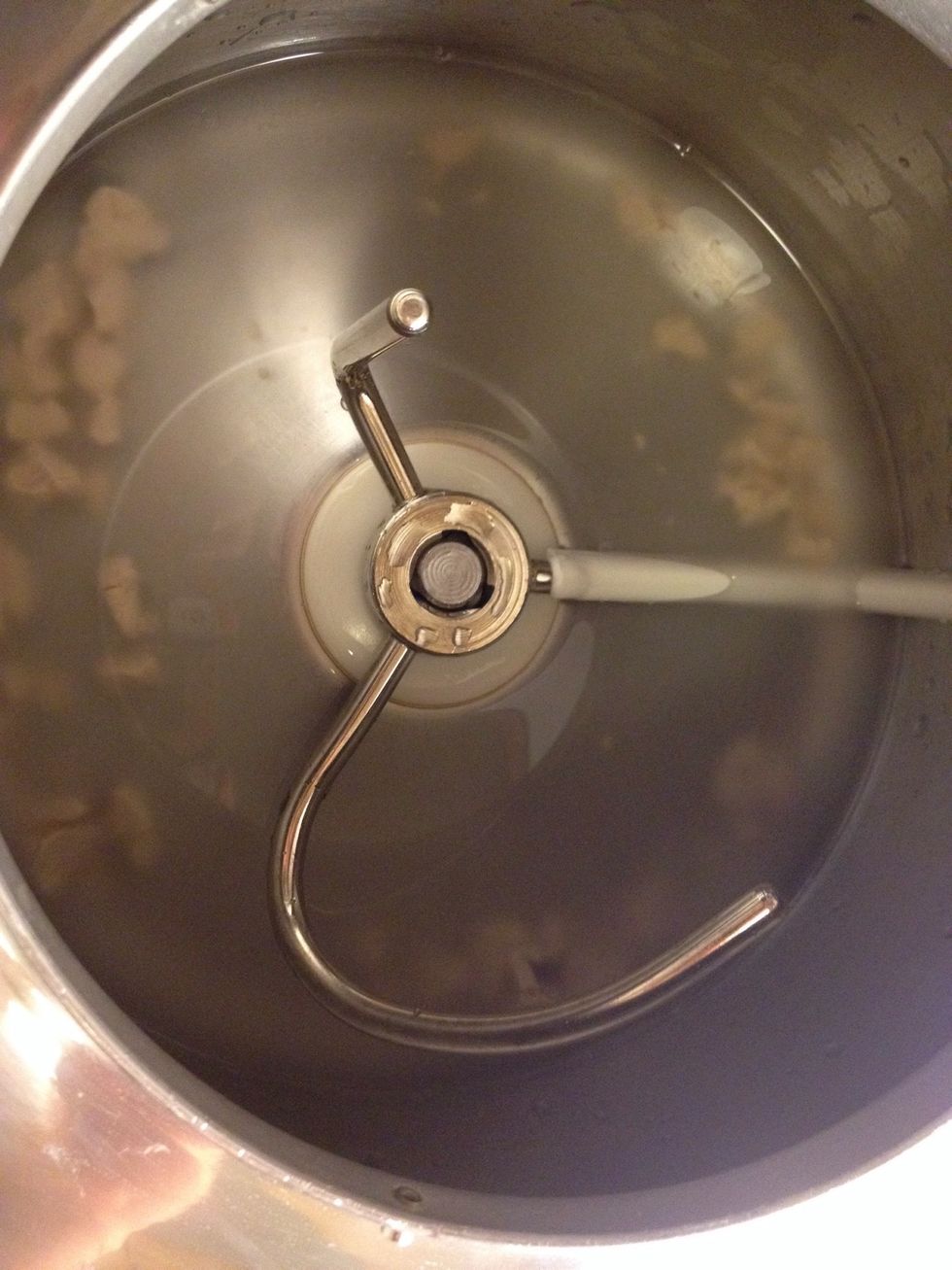 Mix yeast and water, either in your kitchen Assistant or by hand.