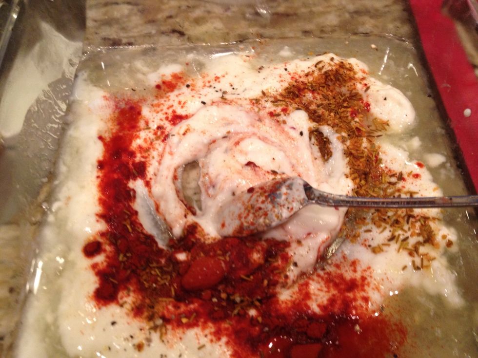 Mix yogurt, garlic and all the spice together in a baked tray