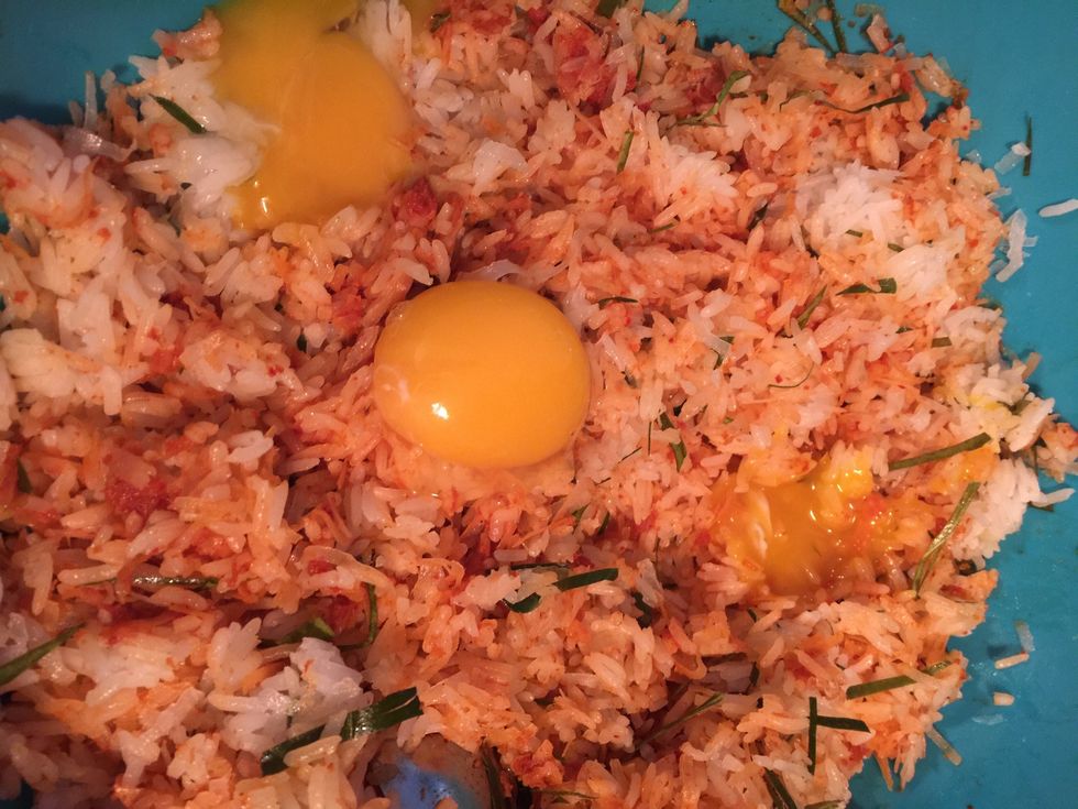 Mix yolks into rice mixture. The best way is by hand. And I recommend wearing gloves.