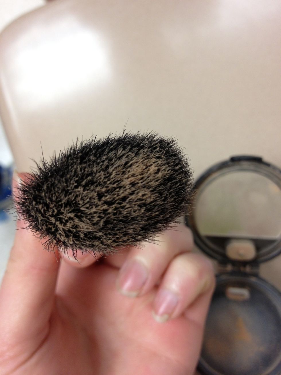 Mix your brush into the Bronzer, until you have a medium amount of Bronzer on your brush.