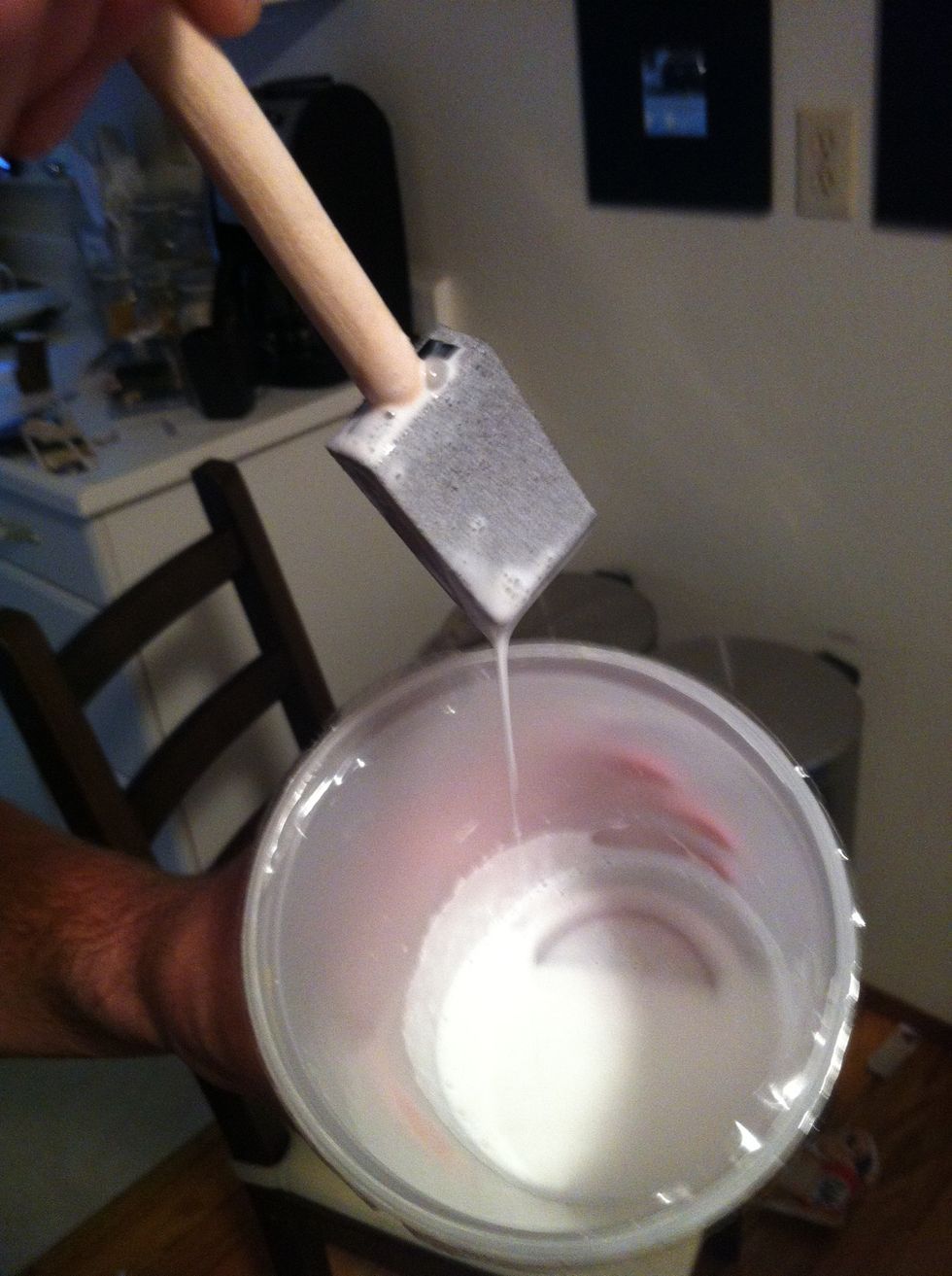 Mix your Elmer's glue and water in a container with a small foam brush. The solution should be 3 parts glue, 1 part water.