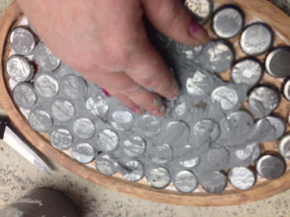 Mix your grout and apply. Be sure to get the grout in the little hidden areas.