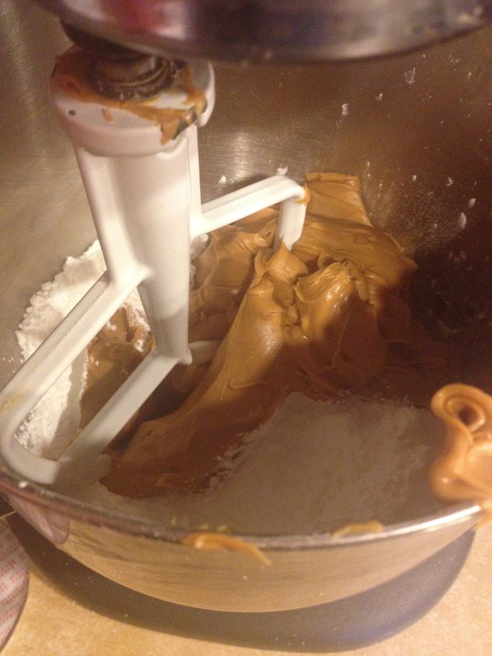 Mix your peanut butter (2 cups). And your sugar in an electric mixer