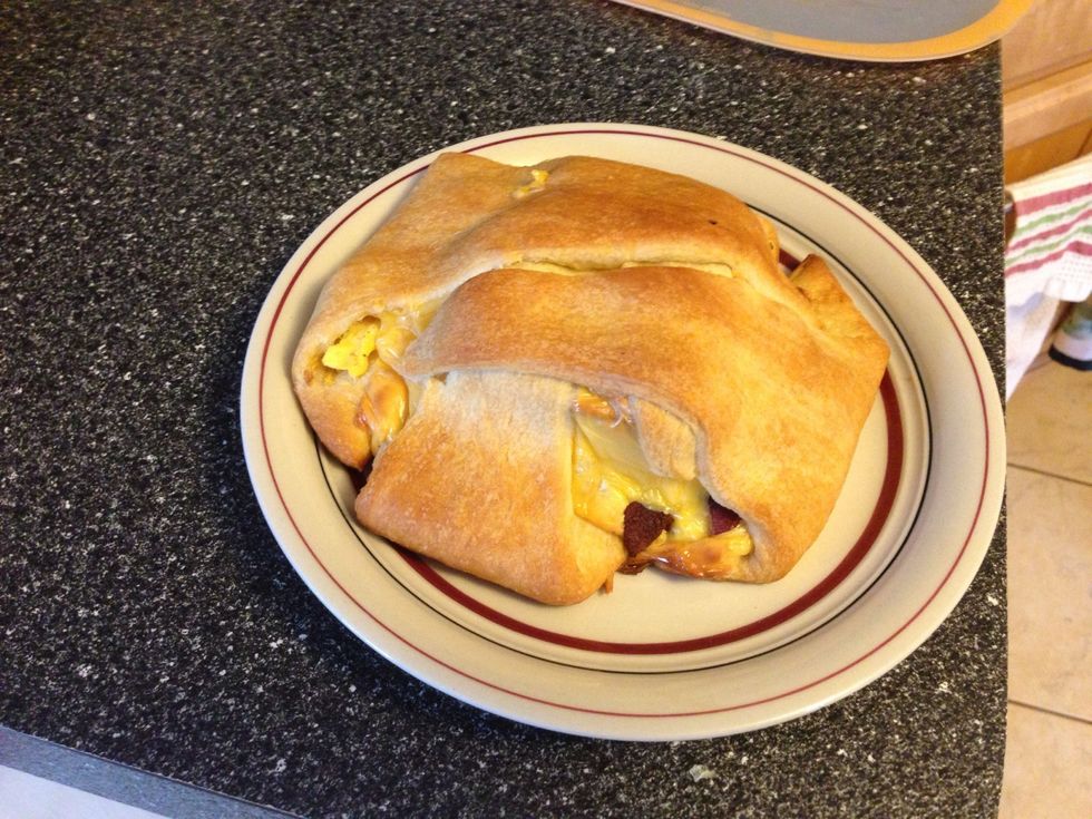 Mmm. She'll be impressed by how quickly you whipped this up. Bake at 375 for 10-13 mins. Follow crescent instructions basically. Don't forget to preheat while cooking eggs and assembling.
