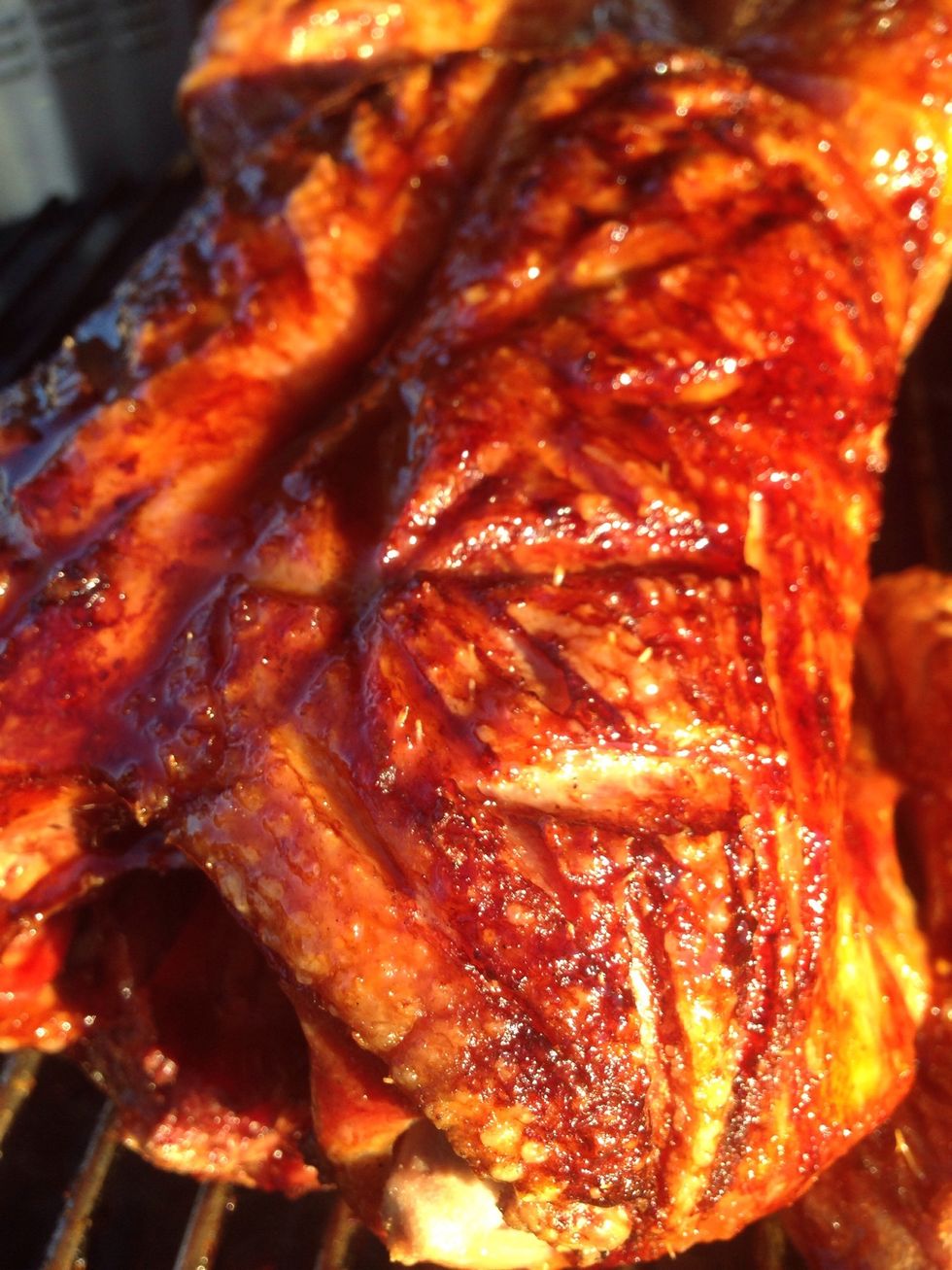 Mmmm, crispy and glazy. Going to flip and re-glaze every 2 minutes or so for about 10-12 minutes. Keep an eye on it, if over direct heat the sugars in the glaze can burn quickly.