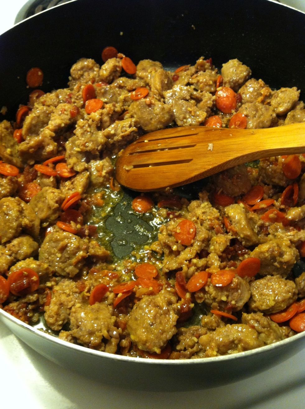 Mmmm yummy. I warm you though, it's a little greasy and the pepperoni makes it a little salty, you can drain the sausage before adding the other stuff, or add a touch of brown sugar to cut some...