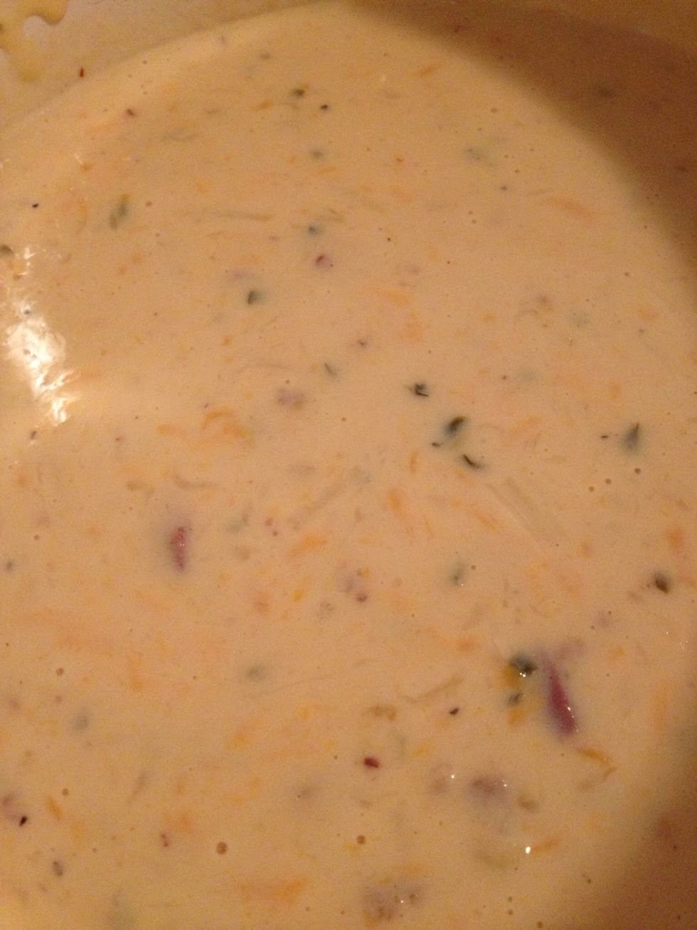 Mmmmm....cheese sauce. Stop tasting it now. You need to add the pasta!