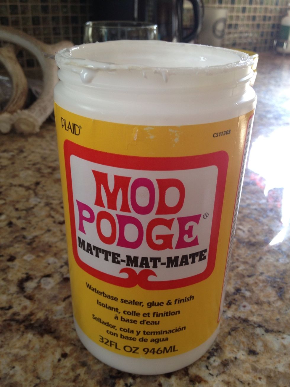 Mod podge. We used the matte kind.