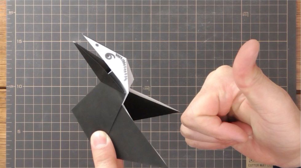 Model complete!! Holding each wing, bring them together and apart. The mouth of the crow will open and close like it\u2019s talking.