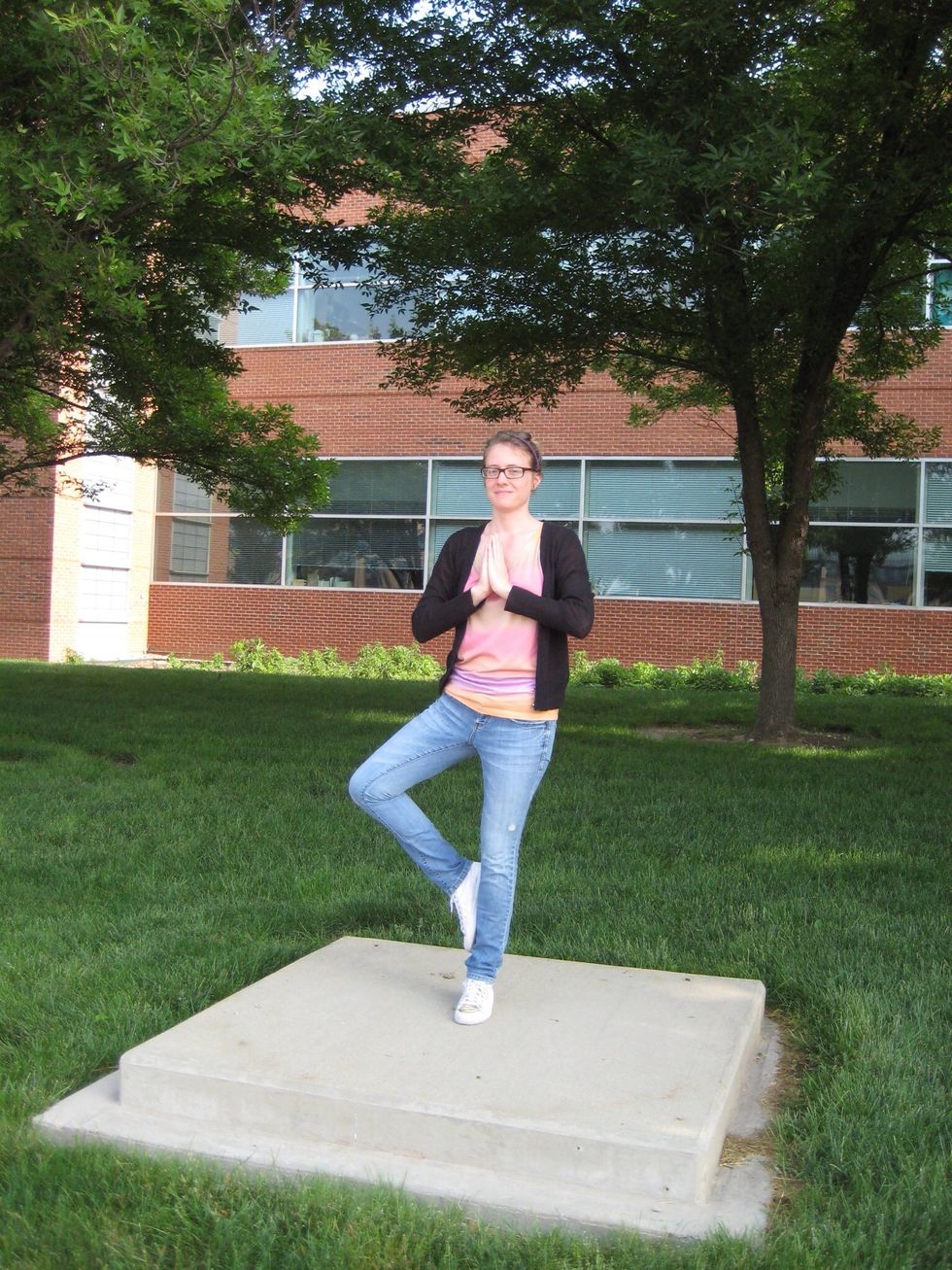 Modified Tree pose \u2013 place foot against opposite ankle or calf, knee to side, palms to heart, then hands overhead
