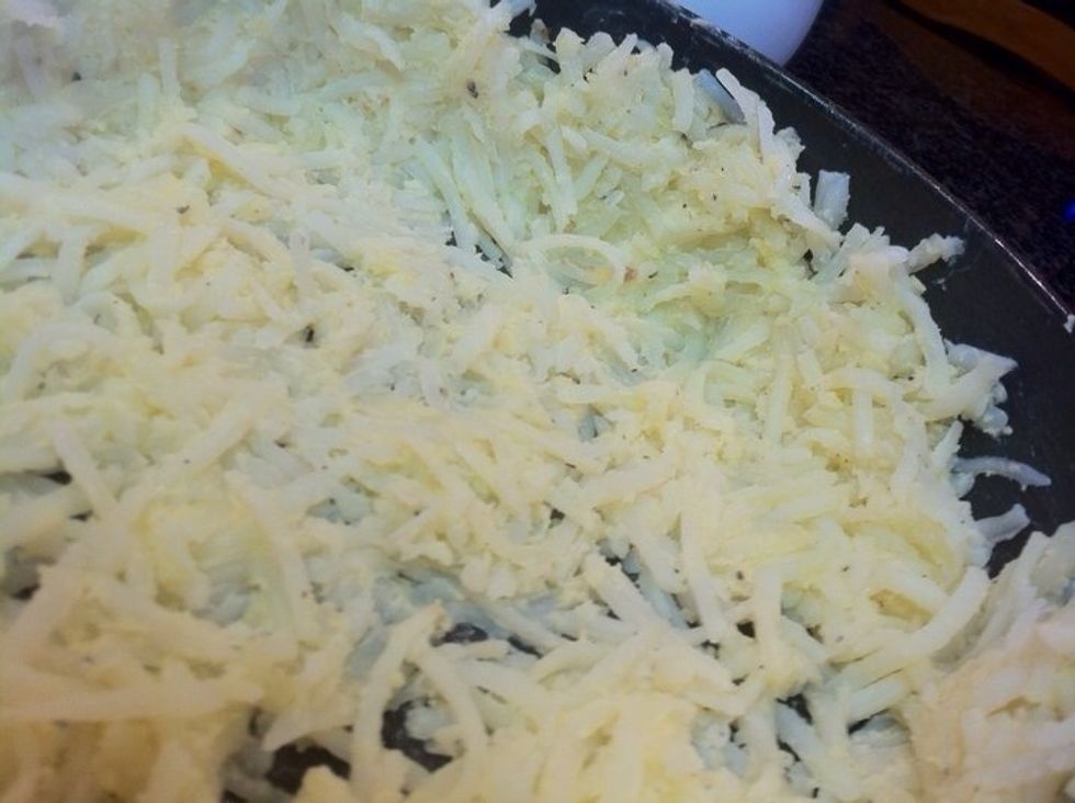 Mold the potato around the springform pan and up the sides.  This will be like a nest for the rest of the stuff.  Put this in the oven on 300 degrees until the potato starts to brown just slightly.