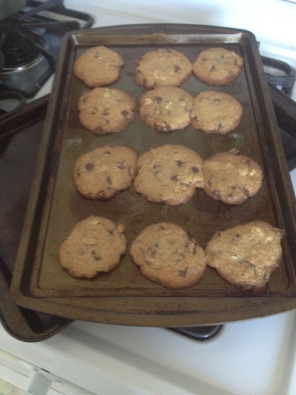 More coming out of the oven! Depending on cookie sizes, this recipe can make up to five dozen cookies. I made different sizes so there are about 3 dozen in this batch. Cookies harden as they cool.