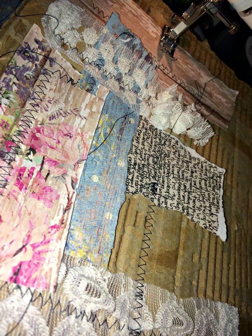 More paper and lace. It doesn't have to be perfect. Sew things on in different direction, layering them a bit on top of each other as you go. You can also do this with glue if you dont have a machine