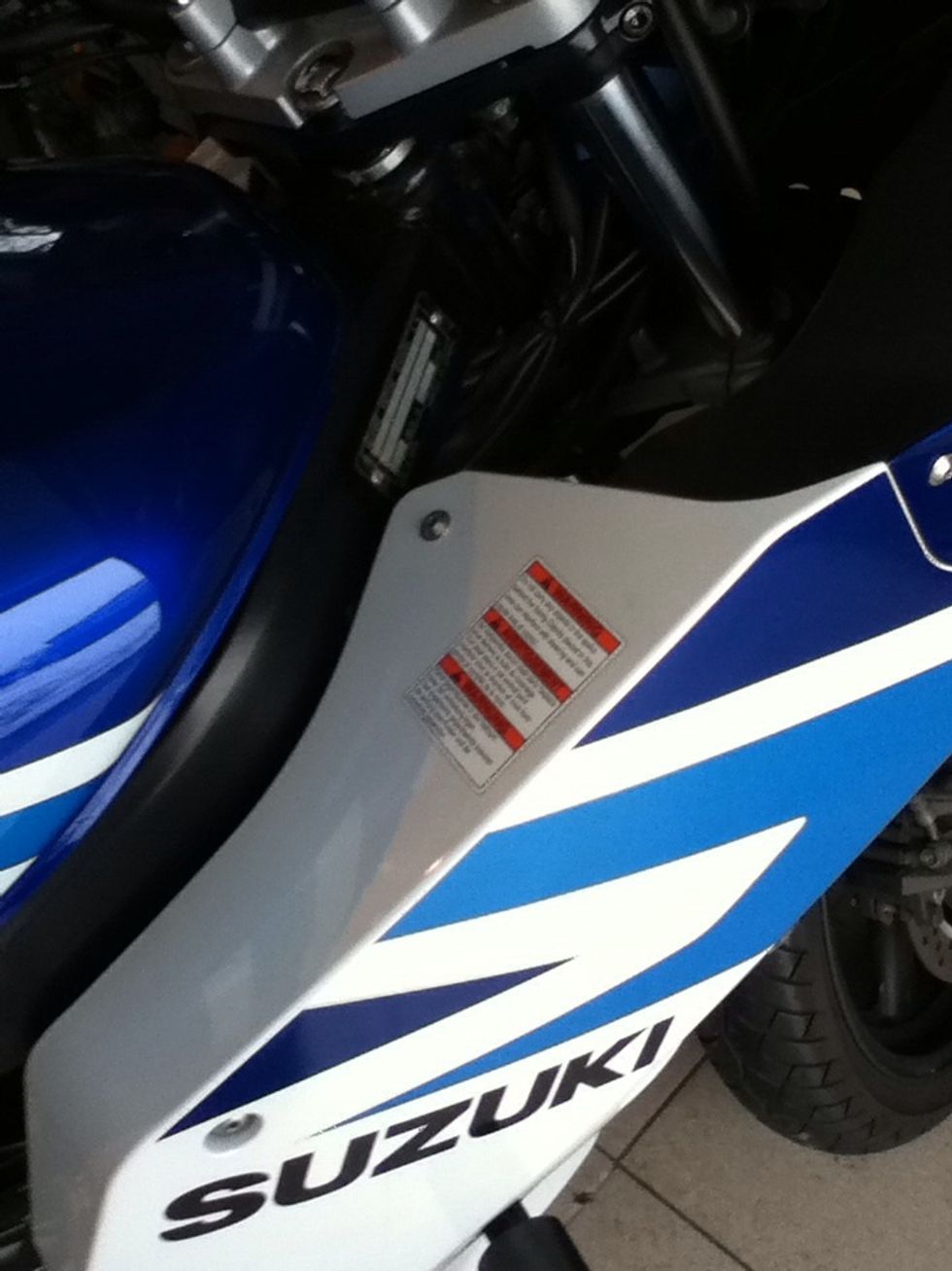 Most cars and bikes come with these ugly warning stickers on them. Here's how you get rid of them without damaging your precious vehicle...