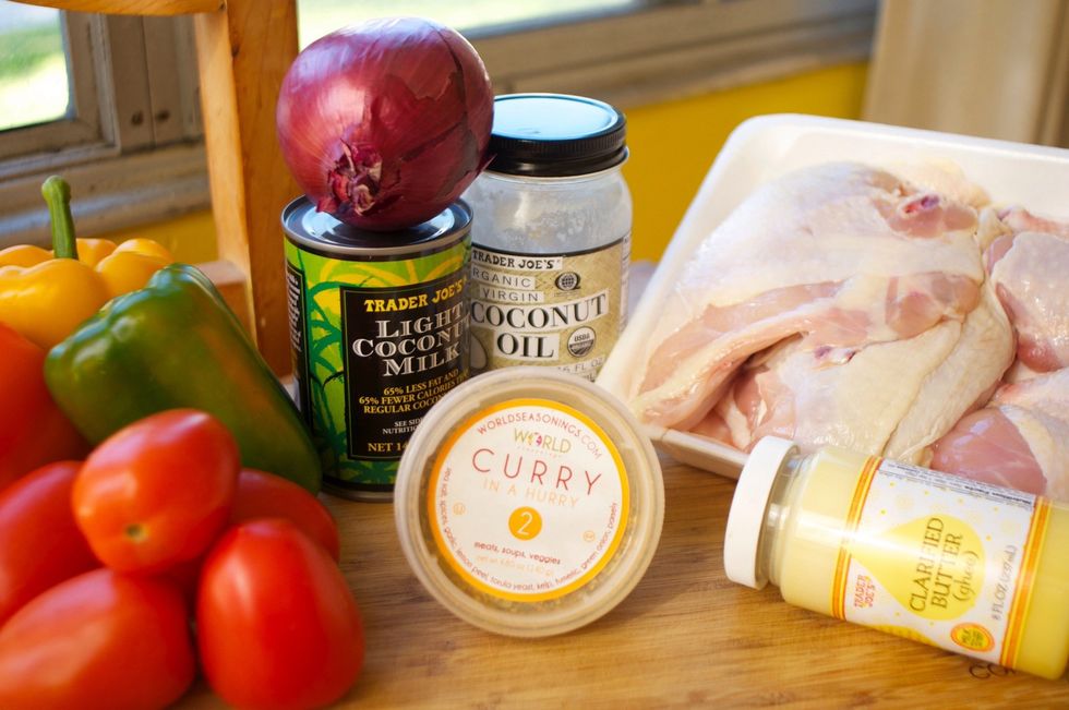 Most grocery stores will have a chicken broken down into 6-8 pieces. Make sure you get chicken with the bones, they add a lot more flavor to the dish. As usual, if you're near Trader Joes, go there!