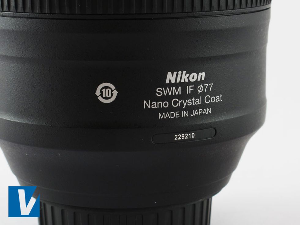 Most new Nikon lenses feature a serial number. If the seller has photographed theirs make sure it matches the serial number on the box and any paperwork.