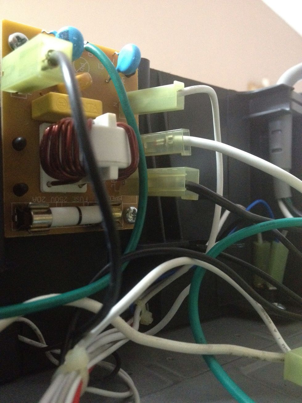 Most of the time if you follow the power cord, you'll find the fuse. It's on the bottom of this circuit board