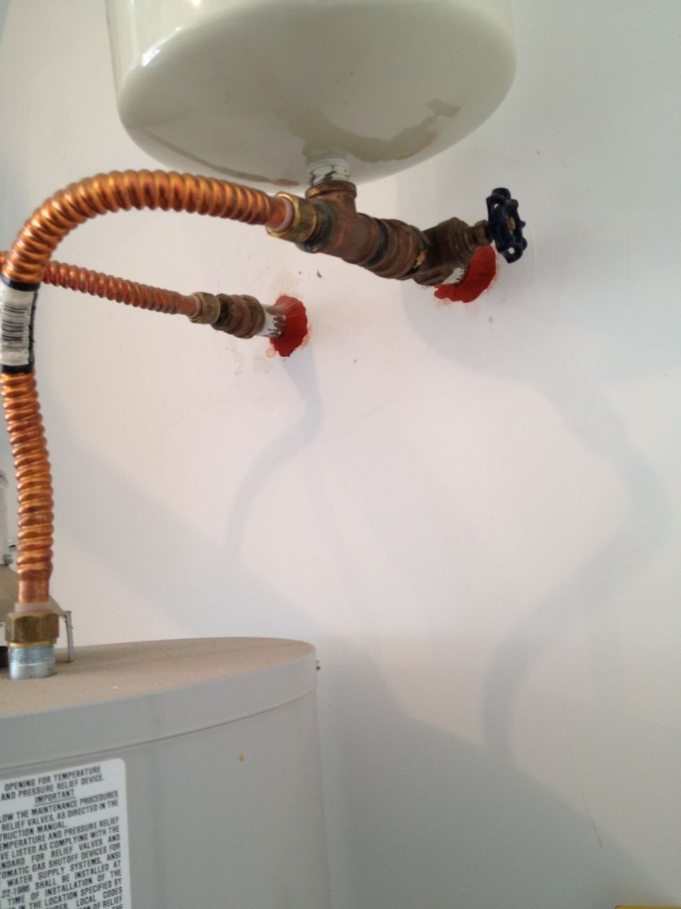 Most water heaters have 1 valve; this will be the cold water supply. If you have 2 valves, just feel the lines- the cold line will be the supply.