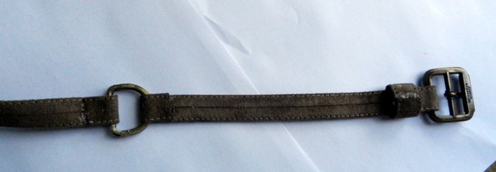 Mount a belt using a leather strap and some metals.