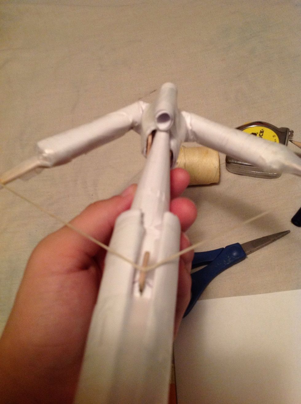Mount it onto your crossbow like in the pencil, make sure that the tube is wide enough for the pencil to travel through and when you go to test it, take the eraser off so it doesn't catch when shot.