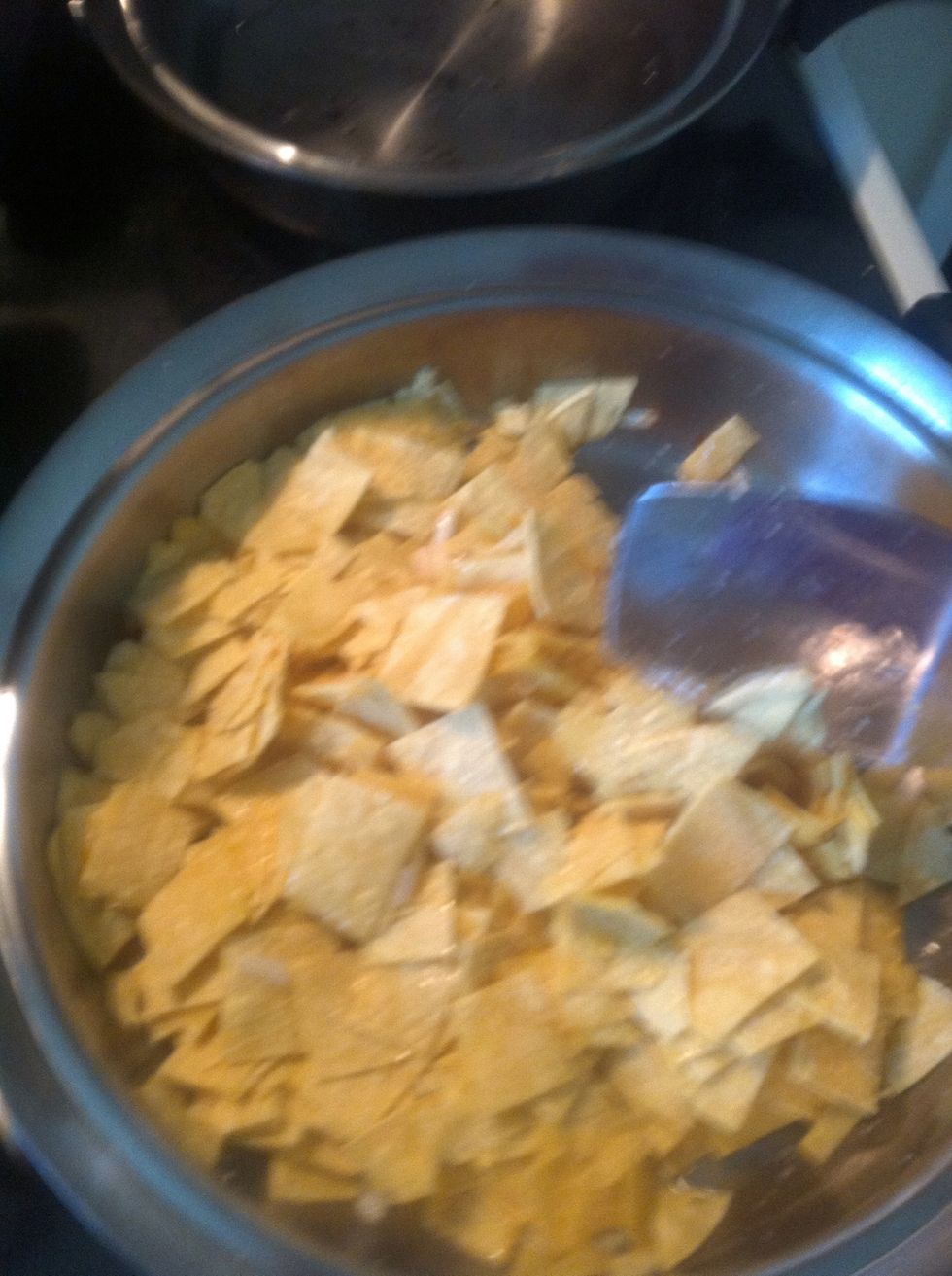 Move around to coat the tortillas with the oil and onion.