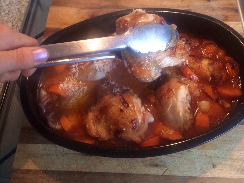 Move chicken around so rice is covered in liquid